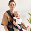 BabyBjorn Śliniaczek do nosidełka Harmony Biały